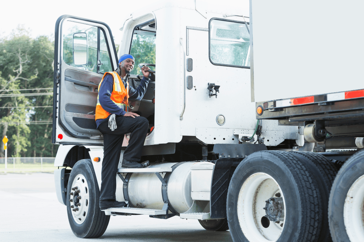 Image of a truck driver practicing truck driver safety tips